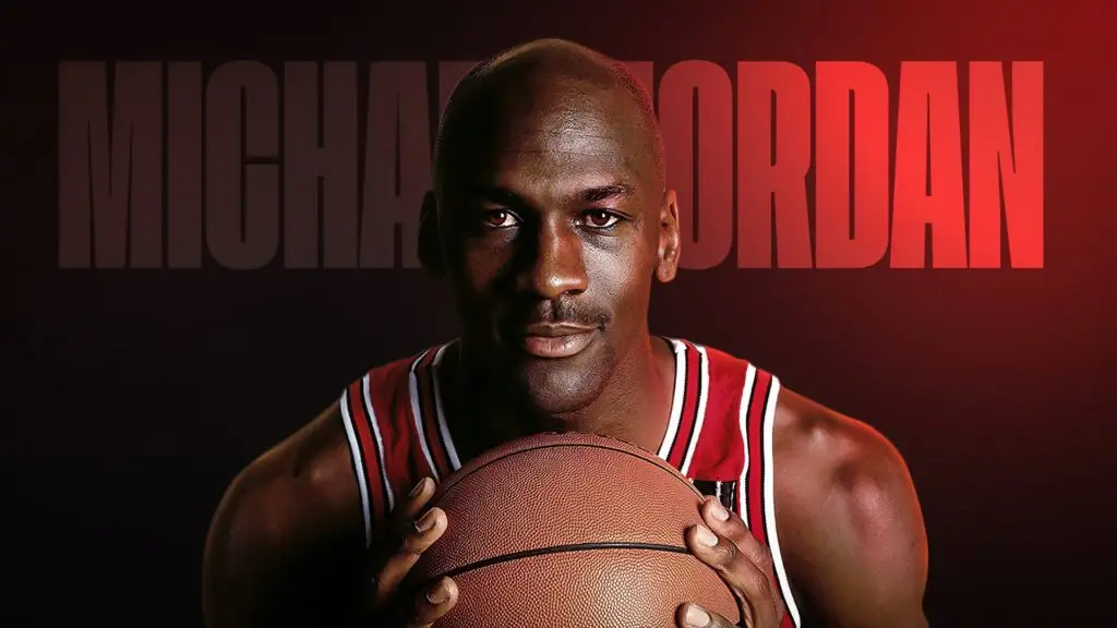 Michael Jordan in action on a basketball court, illustrating his determination to overcome failures.
